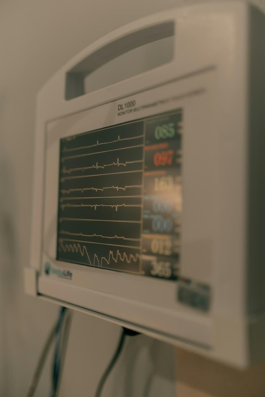 Close-up of a cardiac monitor displaying vital signs