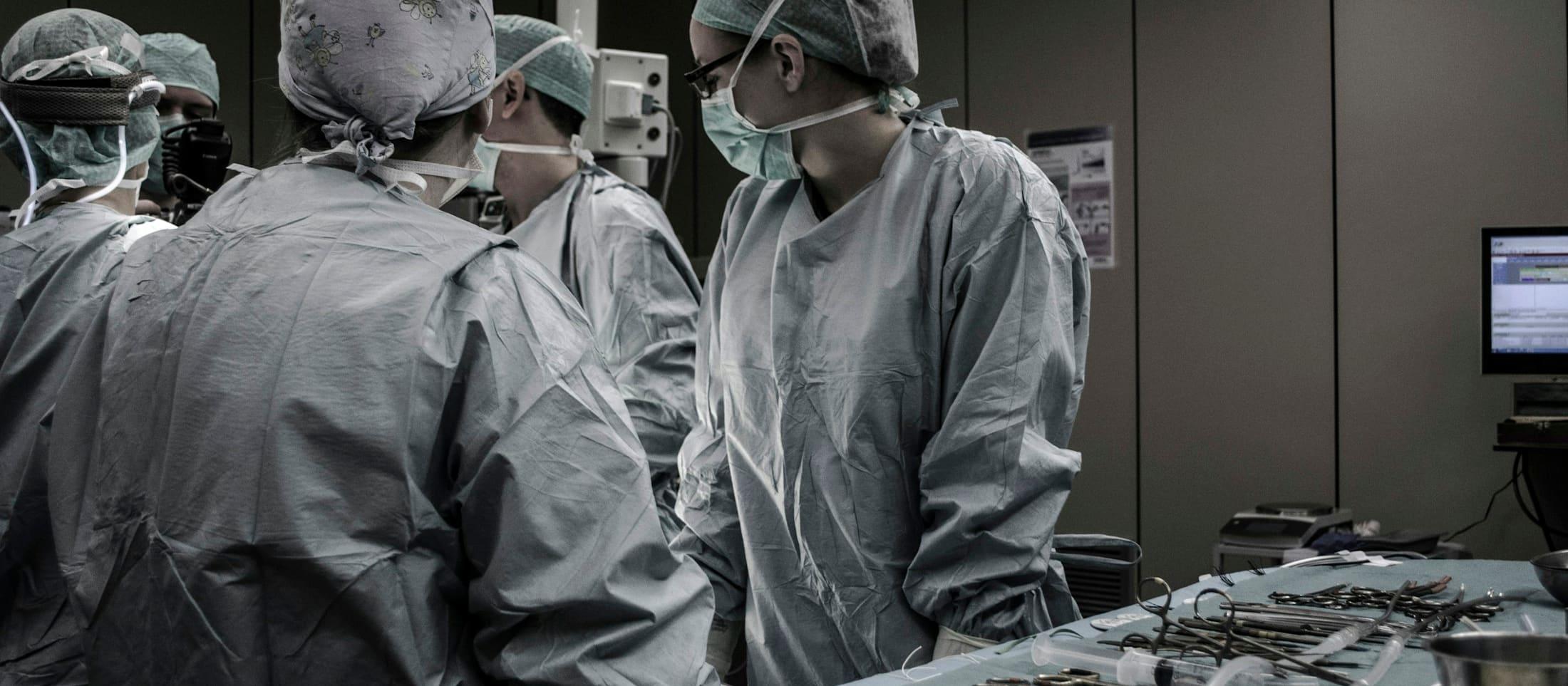 Surgical team collaborating in an operating room